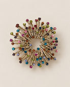 Broche Couronne Strass Rayons, packshot sur fond beige