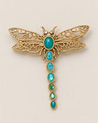 Broche Libellule Filigrane Pierres, packshot sur fond beige