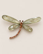 Broche Libellule Ailes Pailletées, packshot sur fond beige