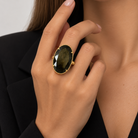 Bague Ovale Pierre Noire Dorée - ModeAccess